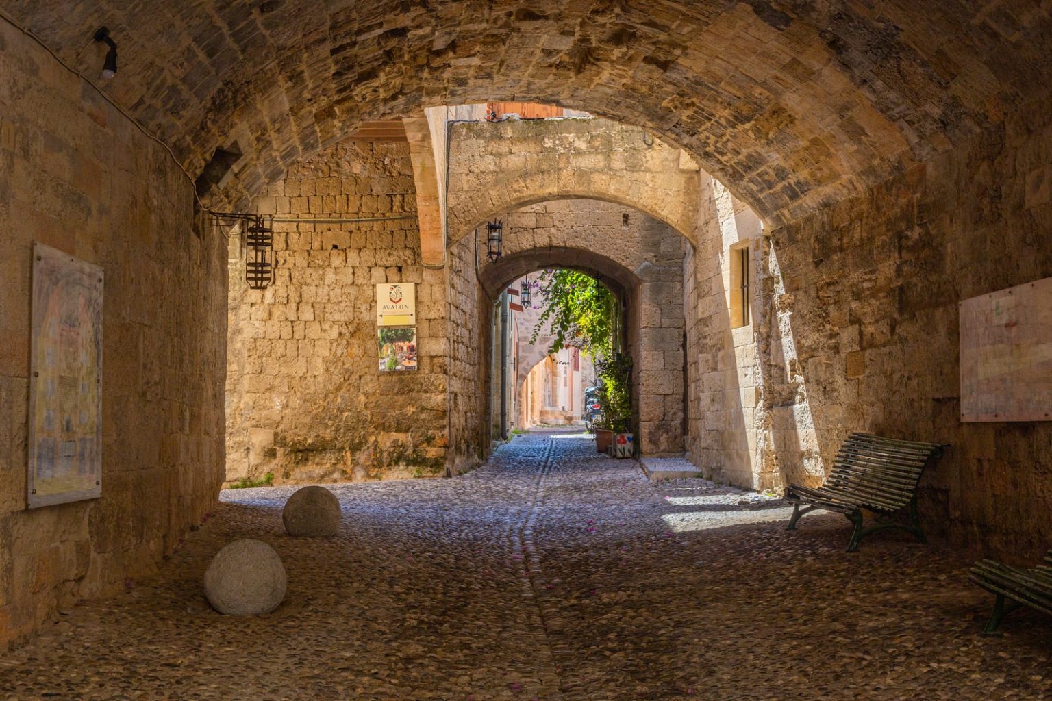 The 10 most impressive castles in Greece 11 brown brick tunnel with green plants